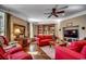 Comfortable living room with hardwood floors, plush couches, and a large TV at 1539 Old Town Ave., Georgetown, SC 29440