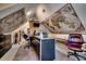 Unique office space featuring custom desk, sloped ceilings, and world maps at 1539 Old Town Ave., Georgetown, SC 29440