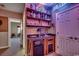 Convenient wet bar featuring a mini-fridge, microwave, and ample storage space at 1539 Old Town Ave., Georgetown, SC 29440