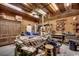 A spacious workshop, equipped with a variety of tools and equipment, ideal for woodworking projects at 1539 Old Town Ave., Georgetown, SC 29440