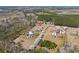 Aerial perspective of the property with lush greenery, showcasing serene rural setting at 1651 Circle Bay Dr., Longs, SC 29568