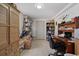 Functional home office area with ample storage shelves and a neutral color palette at 1651 Circle Bay Dr., Longs, SC 29568