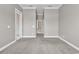 Unstaged bedroom with walk-out to patio and neutral color scheme at 169 Northside Dr., Little River, SC 29566