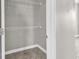Walk-in closet with carpet flooring and shelving at 169 Northside Dr., Little River, SC 29566