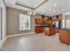 Kitchen and dining area features an island and stainless steel appliances, perfect for cooking and entertaining at 169 Northside Dr., Little River, SC 29566
