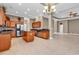 Open-concept kitchen and dining area with stainless steel appliances and granite countertops, great for entertaining at 169 Northside Dr., Little River, SC 29566