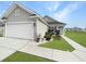 Charming one-story home with a two-car garage, neat landscaping, and a well-manicured lawn at 1908 Gasparilla Ct., Myrtle Beach, SC 29588