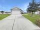 Home exterior with driveway and attached two-car garage at 1908 Gasparilla Ct., Myrtle Beach, SC 29588