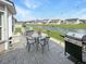 Stamped concrete patio with a gas grill and water view at 1908 Gasparilla Ct., Myrtle Beach, SC 29588