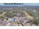 Aerial view of a home and the surrounding area, including the Intracoastal Waterway at 20 Brassie Dr., Carolina Shores, NC 28467