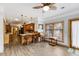 Breakfast nook with wood floors, ceiling fan, and a view into the kitchen at 20 Brassie Dr., Carolina Shores, NC 28467