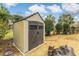 Backyard shed offers great storage with easy yard access and well maintained landscaping around the perimeter at 20 Brassie Dr., Carolina Shores, NC 28467