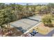 Aerial view of the tennis courts at Carolina Shores at 20 Brassie Dr., Carolina Shores, NC 28467