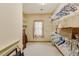 Spacious walk-in closet featuring built-in shelving, hanging racks, and natural light from a window at 20 Brassie Dr., Carolina Shores, NC 28467