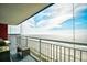 Balcony with wicker furniture and beautiful views of the ocean and beach at 2007 S Ocean Blvd. # 1106, Myrtle Beach, SC 29577