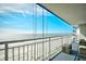 Enjoy breathtaking ocean views from this condo balcony with comfortable seating at 2007 S Ocean Blvd. # 1106, Myrtle Beach, SC 29577
