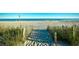 Sandy beach access with dunes and scenic ocean views, ideal for a coastal getaway at 2007 S Ocean Blvd. # 1106, Myrtle Beach, SC 29577