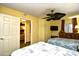 Bedroom featuring a TV, ceiling fan, and relaxing decor at 2007 S Ocean Blvd. # 1106, Myrtle Beach, SC 29577