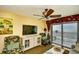 Relax in this cozy living area with a view of the ocean from large windows at 2007 S Ocean Blvd. # 1106, Myrtle Beach, SC 29577