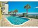 Inviting outdoor pool with palm trees and ocean views, perfect for relaxing at 2007 S Ocean Blvd. # 1106, Myrtle Beach, SC 29577