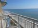 Relax on this balcony with a view of the sandy beach and the beautiful blue Atlantic Ocean at 2007 S Ocean Blvd. # 1106, Myrtle Beach, SC 29577