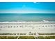 Lovely beach view with ample space for activities, featuring beautiful sand and relaxing blue umbrellas at 2007 S Ocean Blvd. # 1106, Myrtle Beach, SC 29577