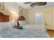 This comfortable bedroom has two beds with a connecting bathroom and ceiling fan at 2007 S Ocean Blvd. # 1106, Myrtle Beach, SC 29577