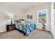 Cozy bedroom with natural light, a comfortable bed, and neutral décor at 264 Palmetto Sand Loop, Conway, SC 29527