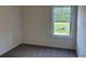 Neutral bedroom with plush carpeting, a bright window and view of a green lawn at 264 Palmetto Sand Loop, Conway, SC 29527