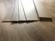 Sample of wood laminate flooring at 264 Palmetto Sand Loop, Conway, SC 29527