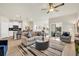 Open-concept living space with kitchen, dining area, and a cozy living room at 264 Palmetto Sand Loop, Conway, SC 29527