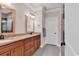 Bathroom with double vanity with granite counters and tile flooring at 2840 Mcleod Ln., Myrtle Beach, SC 29588