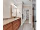 Bathroom with double vanity with granite counters and tile flooring with tiled shower at 2840 Mcleod Ln., Myrtle Beach, SC 29588