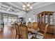 Spacious dining area adjacent to the living room features coffered ceilings and dark wood floors at 2840 Mcleod Ln., Myrtle Beach, SC 29588