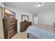 Comfortable bedroom featuring dressers, carpeted floors and neutral colors creating a peaceful ambiance at 3032 Red Bark Dr., Conway, SC 29526