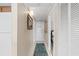 Hallway with tile floors, light-colored walls and neutral color decor at 311 69Th Ave. N # 505, Myrtle Beach, SC 29572