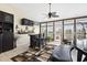 Entertaining bar area with an outdoor entrance, a ceiling fan, and a television at 320 Esher Ct., Myrtle Beach, SC 29579