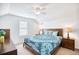 Light filled bedroom with a wooden bed frame and matching dressers at 3964 Lochview Dr., Myrtle Beach, SC 29588