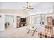 Open concept living room with vaulted ceiling, ceiling fan and large entertainment center at 3964 Lochview Dr., Myrtle Beach, SC 29588