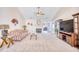 Bright living room featuring neutral walls, a fireplace, and comfortable seating at 3964 Lochview Dr., Myrtle Beach, SC 29588