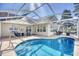 Relaxing screened-in pool featuring a connected hot tub and outdoor seating at 3964 Lochview Dr., Myrtle Beach, SC 29588