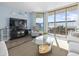 Condo living room featuring a modern ceiling fan, beachy decor and a view of the ocean at 4301 S Ocean Blvd. # 1-B, North Myrtle Beach, SC 29582