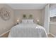 Bright and airy bedroom with a queen bed, featuring a charming coastal decor at 435 Ocean Creek Dr. # 2705, Myrtle Beach, SC 29572