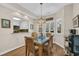 Charming dining area with modern light fixture and easy access to kitchen at 435 Ocean Creek Dr. # 2705, Myrtle Beach, SC 29572