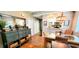 Dining area with glass table and wicker chairs open to kitchen at 435 Ocean Creek Dr. # 2705, Myrtle Beach, SC 29572