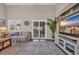 Bright living room featuring sliding doors, comfortable seating, and entertainment center at 435 Ocean Creek Dr. # 2705, Myrtle Beach, SC 29572