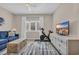 Inviting living room with comfortable blue sofa, contemporary decor, and a serene ambiance at 435 Ocean Creek Dr. # 2705, Myrtle Beach, SC 29572