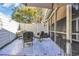 Enclosed patio featuring comfortable seating, outdoor decor and shaded space at 435 Ocean Creek Dr. # 2705, Myrtle Beach, SC 29572