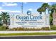 Ocean Creek Plantation sign with information about vacation rentals and the conference center at 435 Ocean Creek Dr. # 2705, Myrtle Beach, SC 29572
