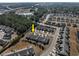 Aerial view of a residential neighborhood showcases landscaping and a well-designed community layout at 517 Poppi Point Ct. # 517, Myrtle Beach, SC 29579